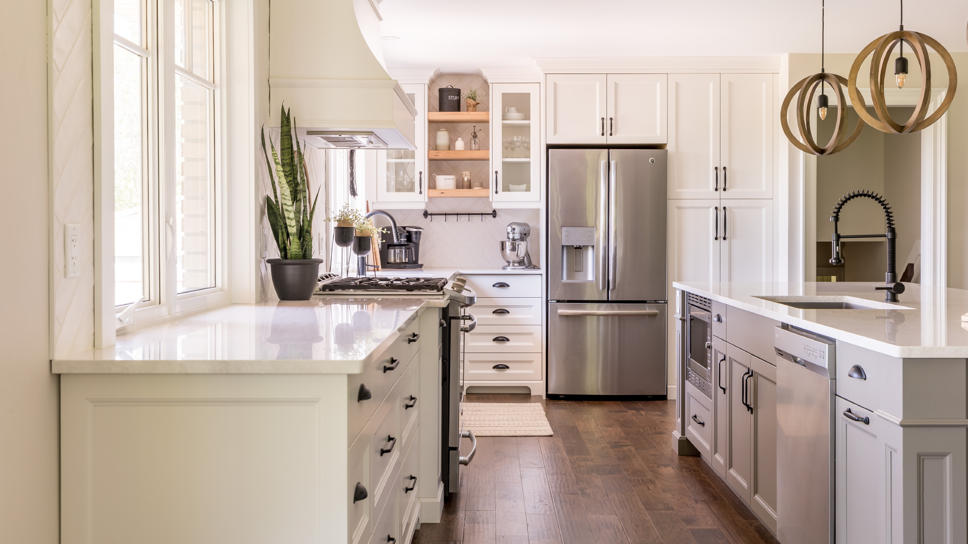 Custom kitchen cabinets with a stainless steel fridge