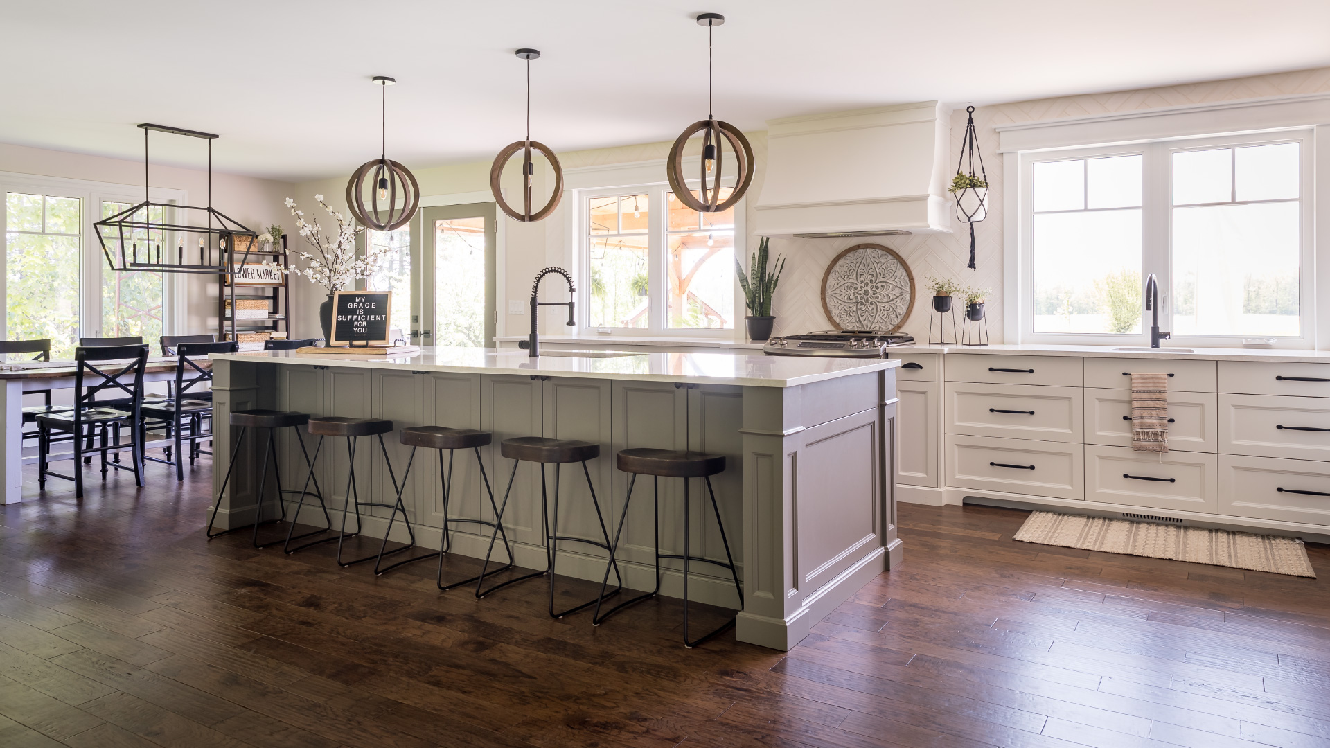 A large custom kitchen island with stools